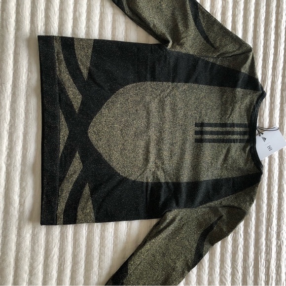 NWT. Wolford STUDIO MOTION CROP Size M
ADIDAS X WOLFORD
Black/Gold - Picture 5 of 6